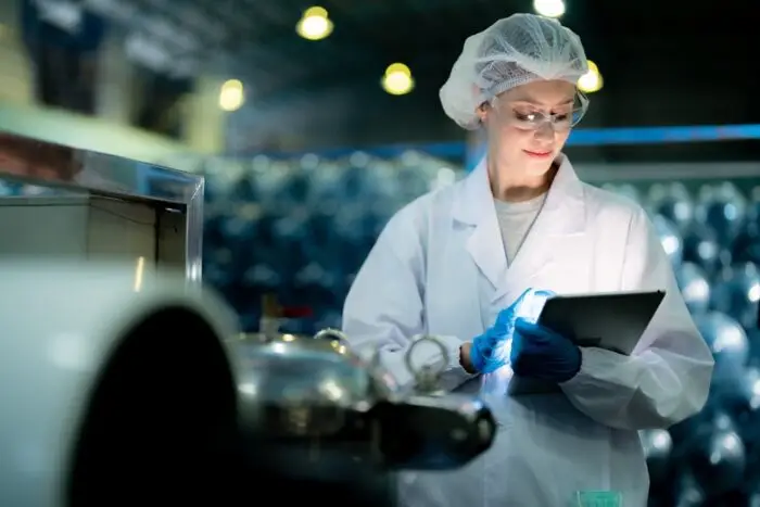 scientist in a manufacturing facility