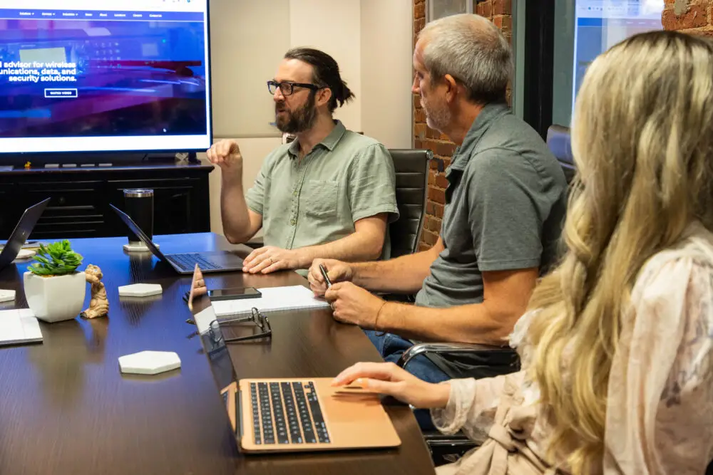 Taylor McClesky and Tim Mesaric in the Beck Digital greenville conference room