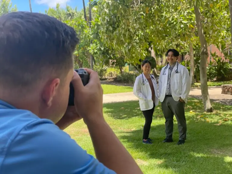 Shawn Stom taking photos of Queens Medical Students for Beck Digital Hawaii