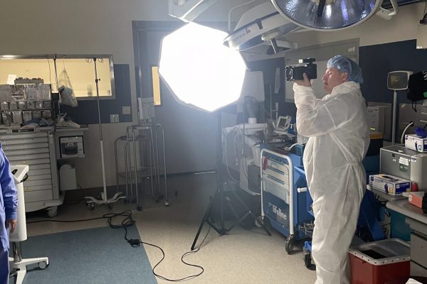 Shawn Stom, the Beck Digital photographer taking photos in the surgical room at Queens Health System