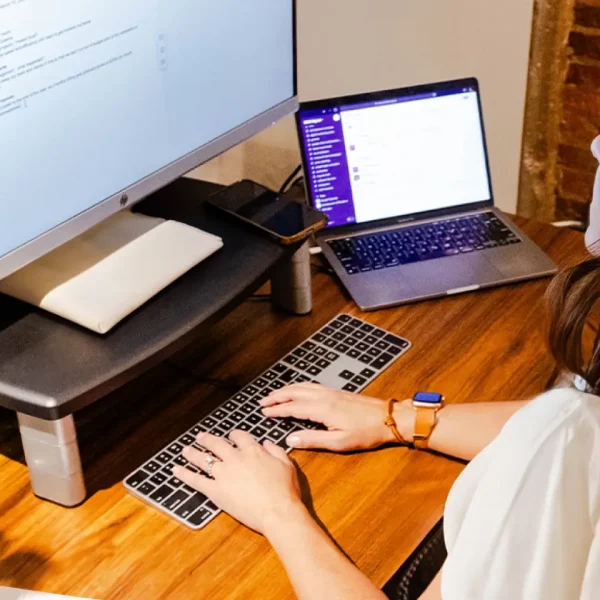 digital strategist working on computer at office