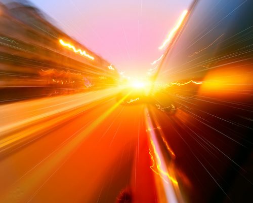 Car,Driving,Fast,Down,In,The,City