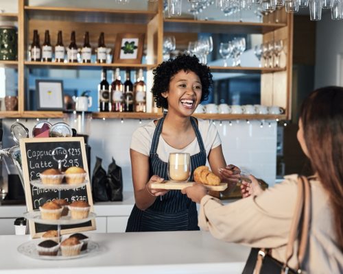 Small business owner interacting with a client.